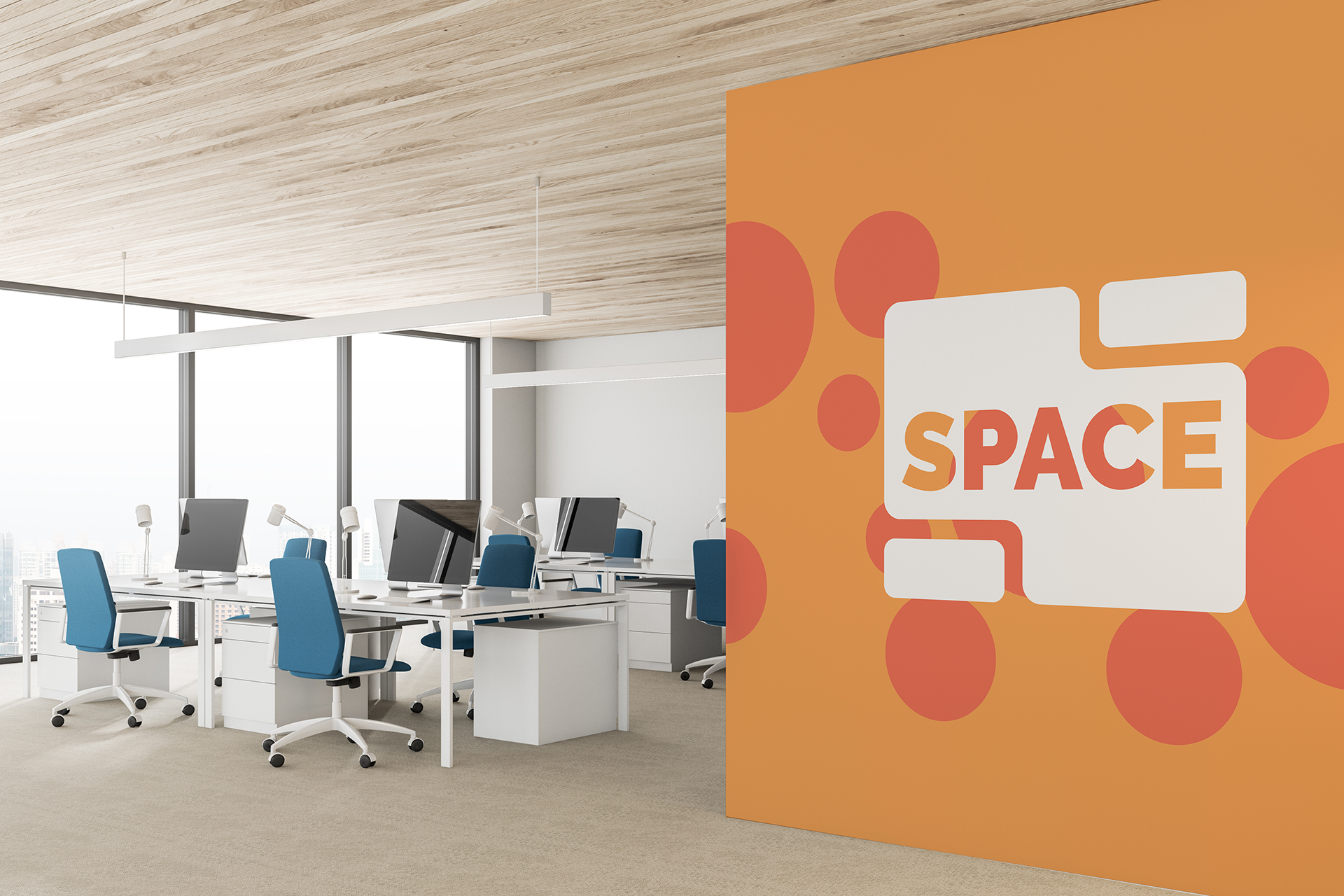 A photo of the interior of an office featuring a mural of the space logo.